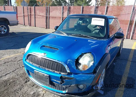 2009 Mini Cooper S z USA, uszkodzony, nr VIN WMWMF73559TW85430